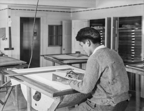 Student working at drafting table