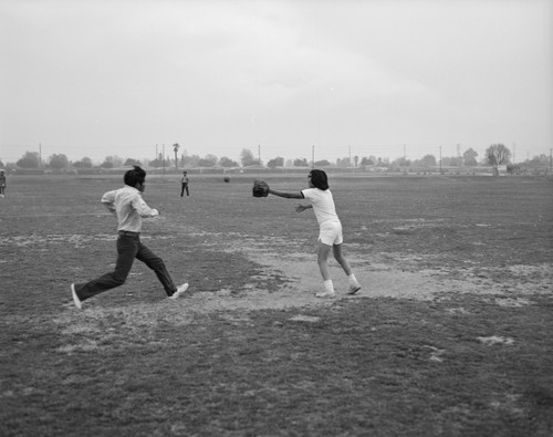 Playing baseball