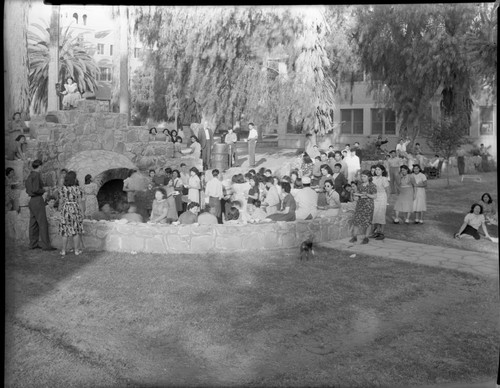 Students gathered around fire pit