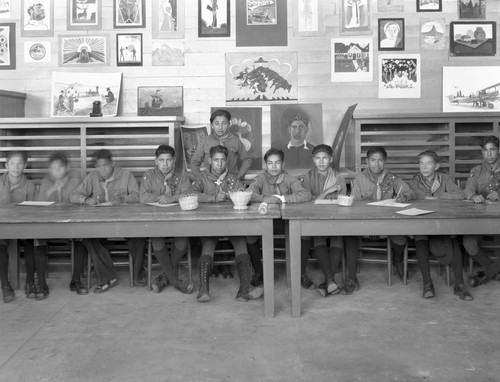 Boy Scouts work on projects in art classroom