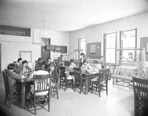 Students work on crafts in classroom