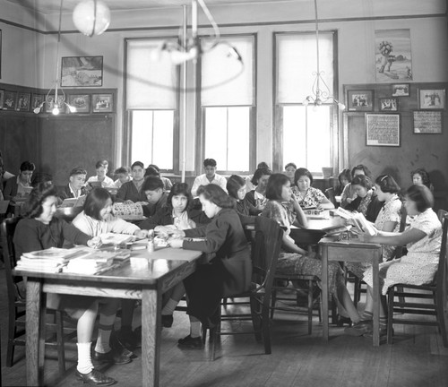 Students studying at tables