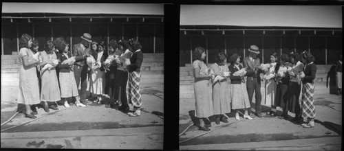 Students holding chickens