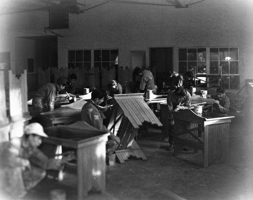 Students finishing furniture