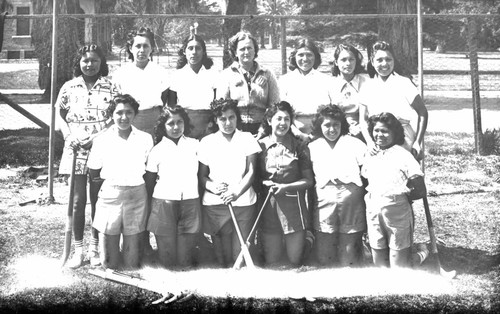 Group portrait of field hockey players