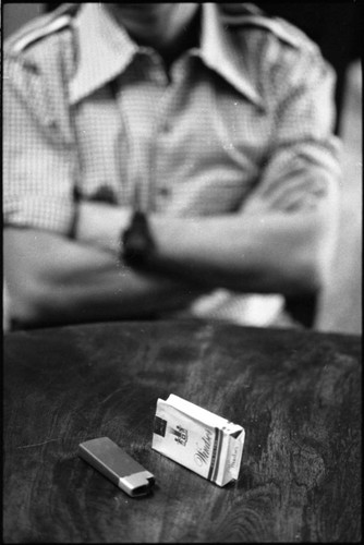 Portrait of Roberto D'Aubuisson's cigarette box and lighter, San Salvador, 1982