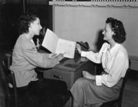 1940s - Two unidentified women at a desk