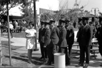 1968 - Teen Hostess Speaking to a Group of Marines at Marine Day