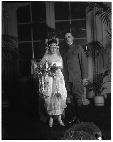 [Full-length wedding portrait of man and woman.]