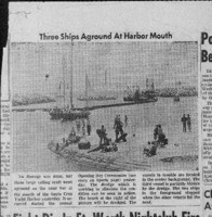 Three ships aground at harbor mouth