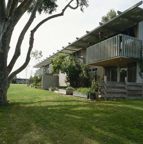 Residential Apartments, Phase One: exterior: back of one building showing balconies and patios