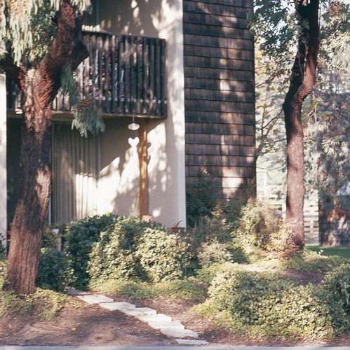 Residential Apartments, Phase Two: exterior: side of one building showing patios and balconies