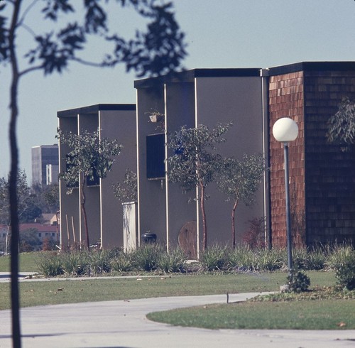 Residential Apartments, Phase Two: exterior: side of one building showing patios and balconies