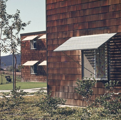 Residential Apartments, Phase Two: exterior: detail of window awnings