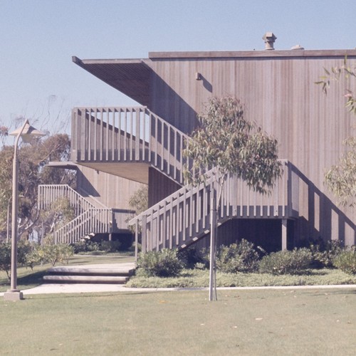 Residential Apartments, Phase One: exterior: side of one building showing balconies and stairs