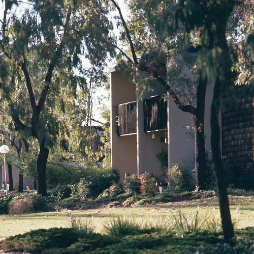 Residential Apartments, Phase Two: exterior: side of one building showing patios and balconies