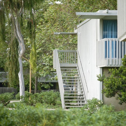 Residential Apartments, Phase One: exterior: side of one building showing stairs