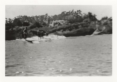 Unidentified surfers at Cowell Beach