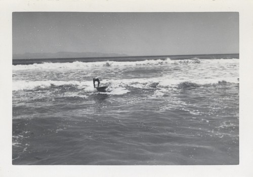 Unidentified surfer at Cowell Beach