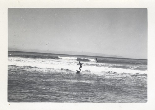 Unidentified surfers at Cowell Beach