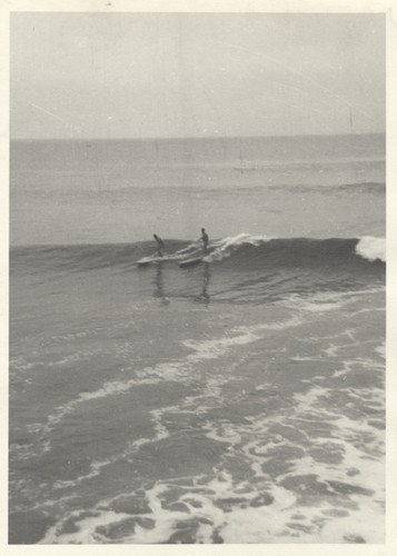 Unidentified surfers at Cowell Beach