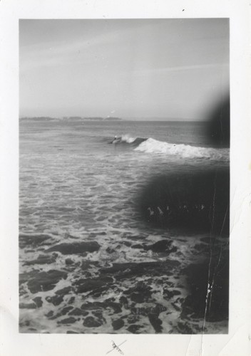 Unidentified surfers at the river point