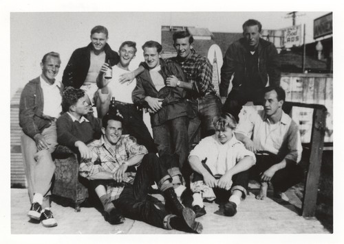 Dave Littlefield, Tommy Roussel, Harry Murray, Lloyd Ragon, Bob Gillies, Harold Goody (back row). Bill Thomas, Harry Mayo, Pete Muttersbach, Ted Nicholson (front row) at Clubhouse, Cowell Beach