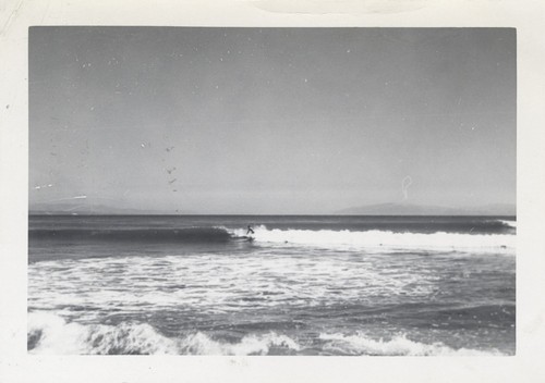 Unidentified surfer at Cowell Beach