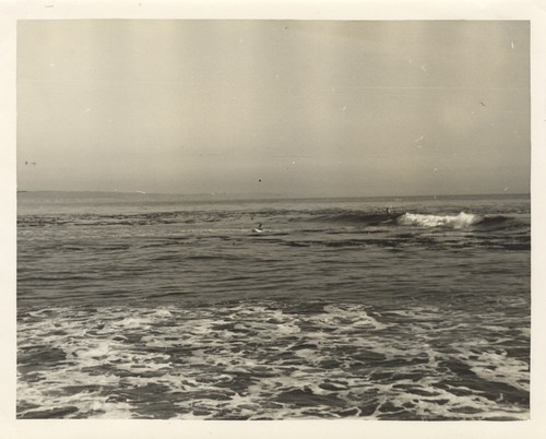 Unidentified surfers at Pleasure Point