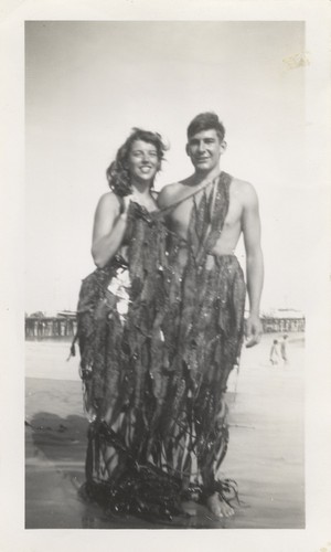 Edie Gates, Bob Rittenhouse dressed in kelp at Cowell Beach