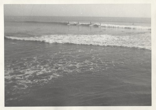 Unidentified surfers at Cowell Beach