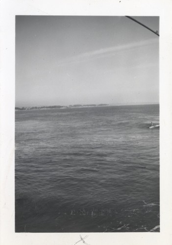 Unidentified surfers at the river point