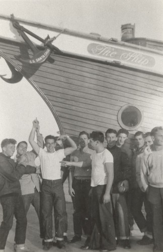 Bob Gillies, Chet Mayo, Harry Mayo, Blake Turner, Terrence Hickey, Sam Maugeri, Frank "Weeg" Knowles, Bill Lidderdale, Bob Rittenhouse, James Henniger, Dave "Count" Littlefield in front of the S.S. Santa Cruz