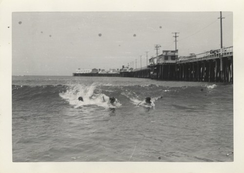 Unidentified surfers at Cowell Beach