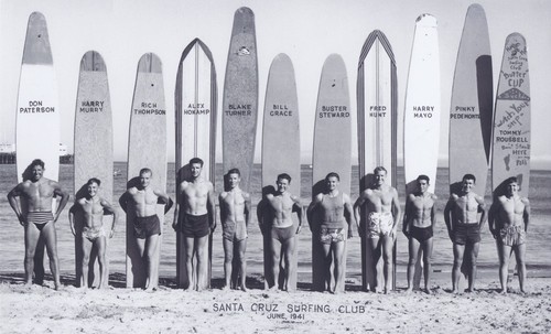 Santa Cruz Surfing Club group portrait: Don "Bosco" Patterson, Harry Murray, Rich Thompson, Alex Hokamp, Blake Turner, Bill Grace, Dave "Buster" Steward, Fred Hunt, Harry Mayo, Alex "Pinky" Pedemonte, Tommy Roussel