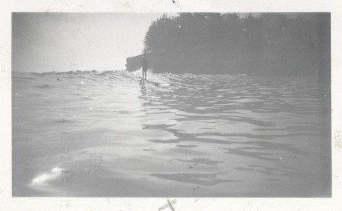 Unidentified surfer at Cowell Beach