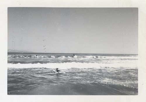 Unidentified surfers at Cowell Beach