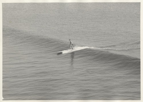 Unidentified surfer at Cowell Beach