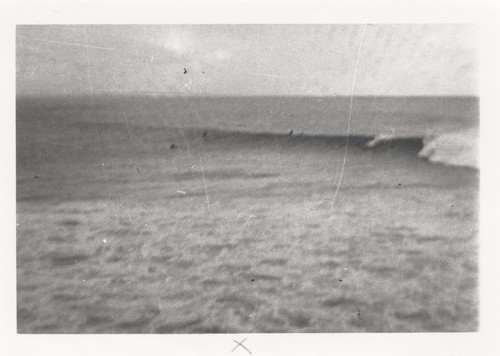 Unidentified surfers at Pleasure Point