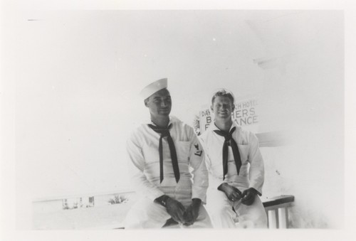 Unidentified sailor and Lloyd Hooper in Navy uniform in Florida