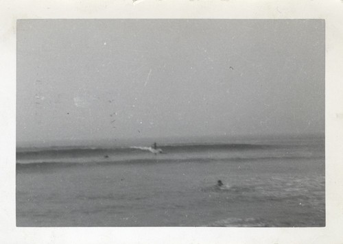 Unidentified surfers at Cowell Beach