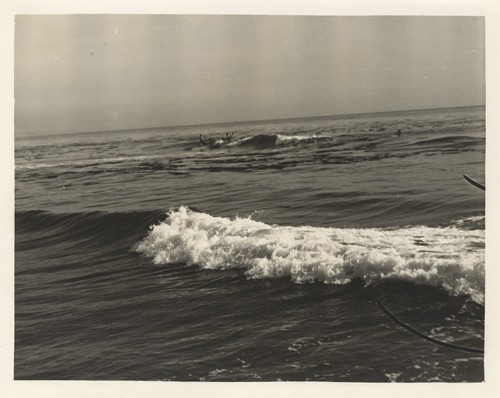 Unidentified surfers at Pleasure Point