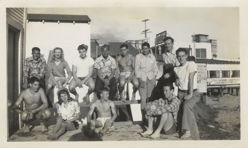 Harry Mayo, Harriet McBain, Jim Taylor, Dave Littlefield, Tommy Roussel, Jerry Owens, unidentified man, James Imlay, Bob Rittenhouse, Edith Ann Gates, Ed Smith, Dave Ledyard at Cowell Beach