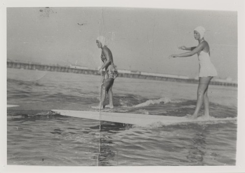 Shirley Templeman, Pat Collings surfing at Cowell Beach