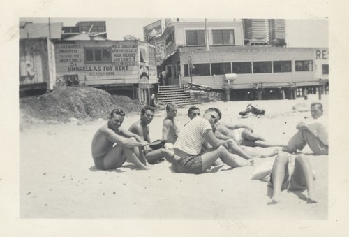 James Henniger, Harry Mayo, two unidentified surfers, Dick Thoma, Dave "Count" Littlefield at Cowell Beach