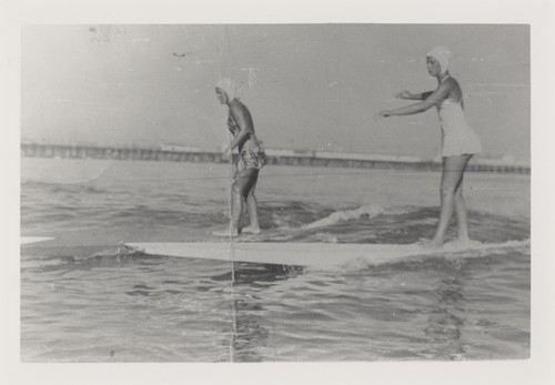 Shirley Templeman, Pat Collings surfing at Cowell Beach