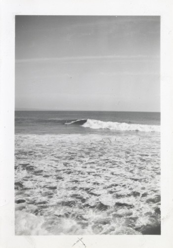 Unidentified surfers at the river point