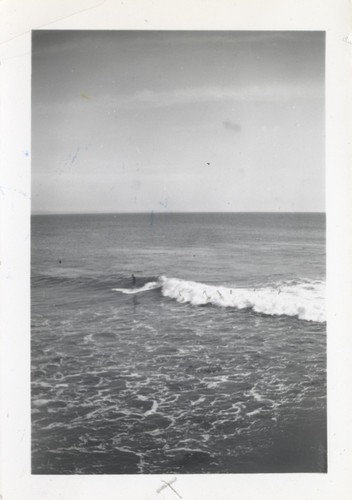 Unidentified surfers at the river point