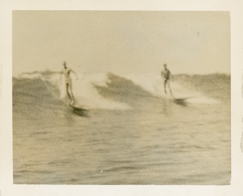 Unidentified surfers at Cowell Beach