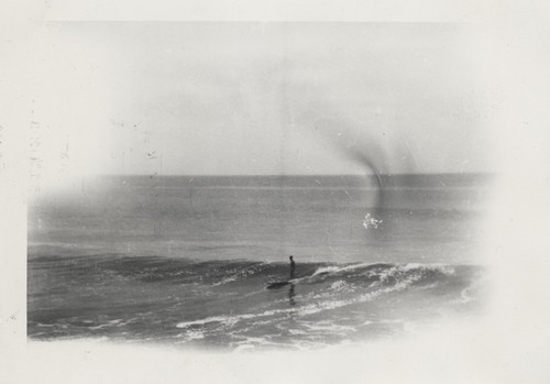 Unidentified surfer at Cowell Beach